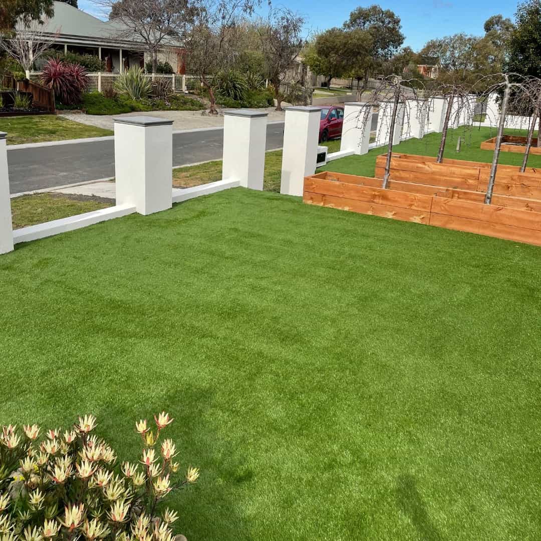 Artificial grass courtyard installation