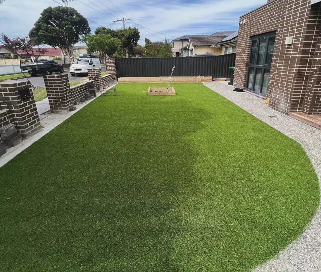 Synthetic grass in a small backyard